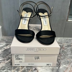 Jimmy Choo black satin dress sandals.